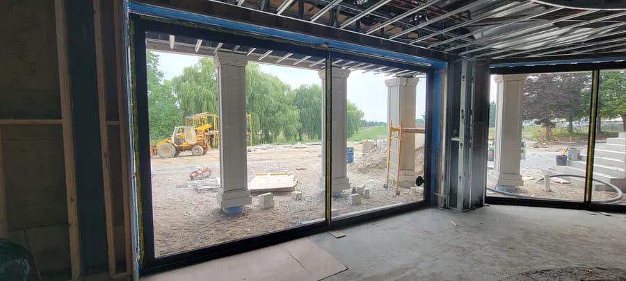 Large sliding door in a new custom home under construction