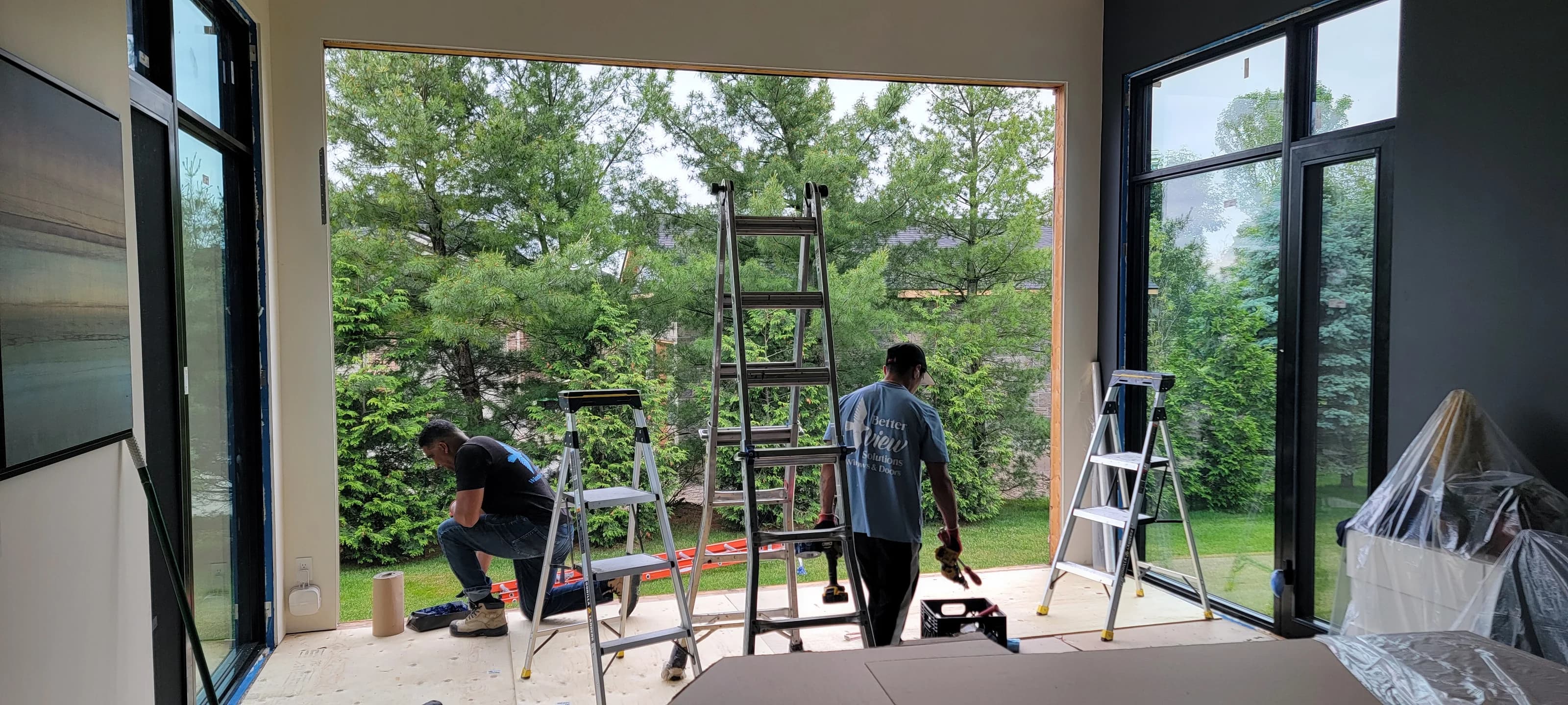 Better View Solutions installation team working on a large opening