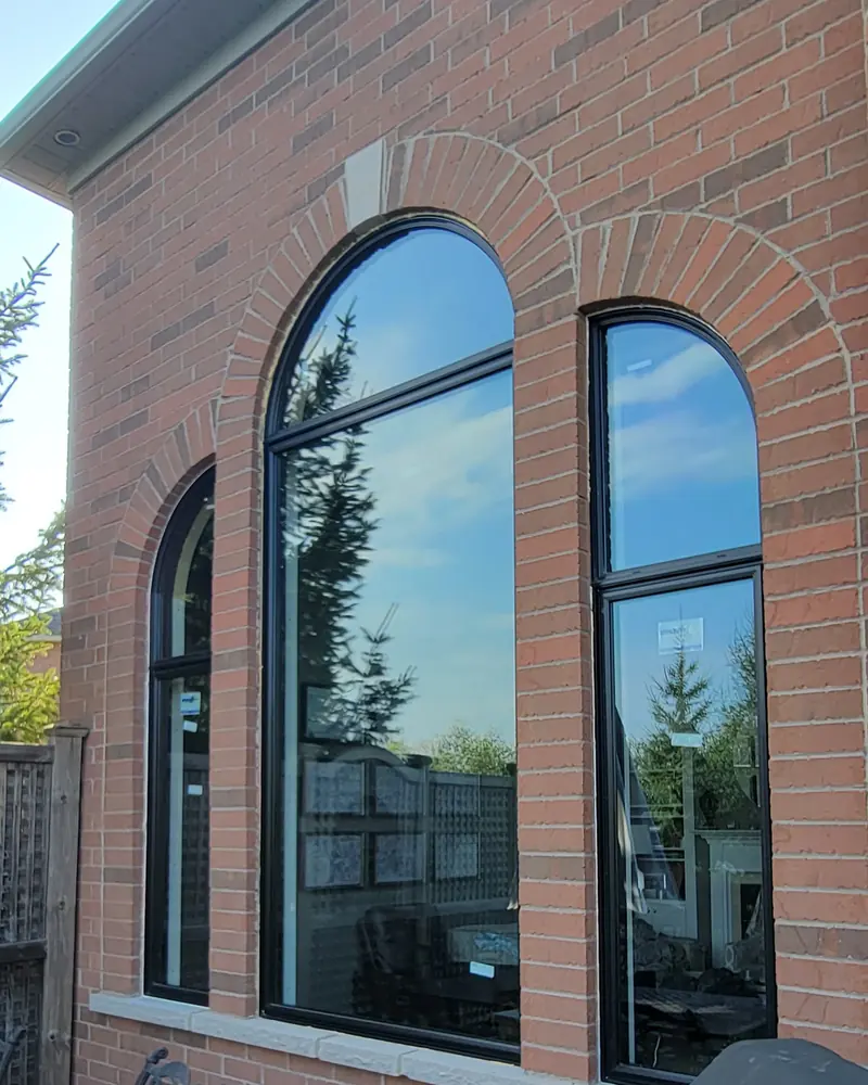Tall black arched windows