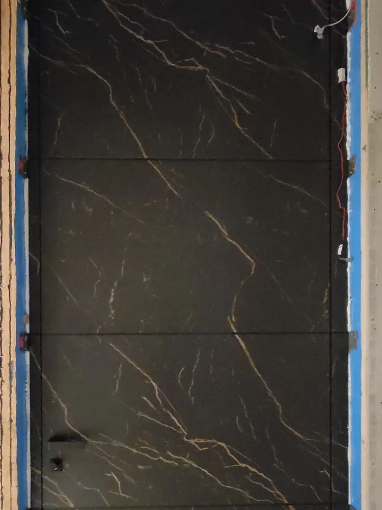 Stone-look pivot door