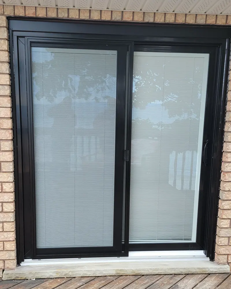 Black sliding door onto the deck