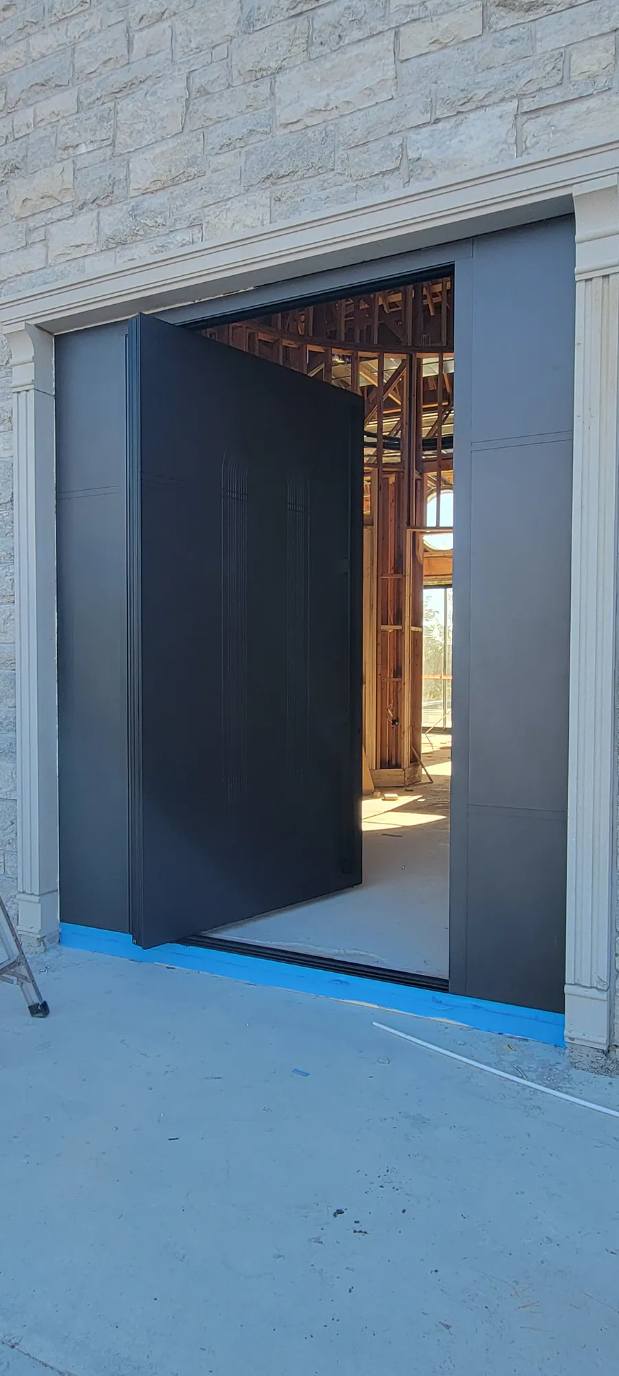 Custom pivot door installed by Better View