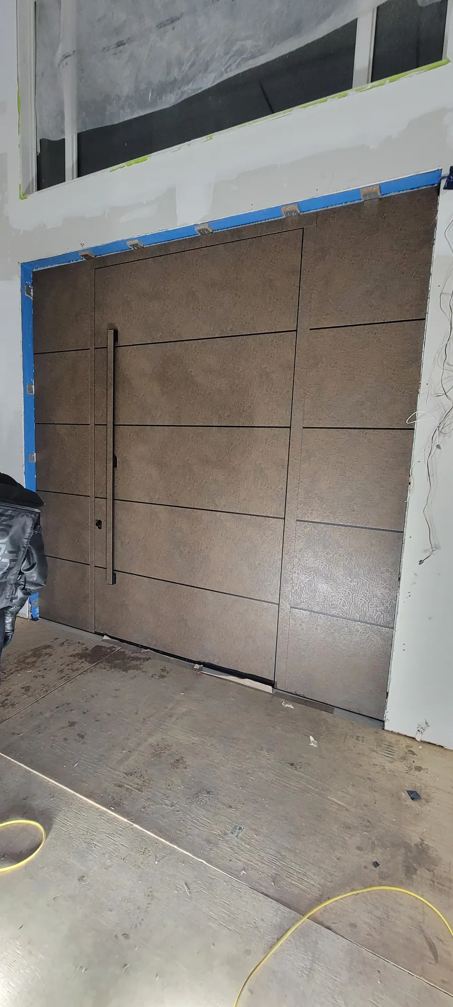 Custom pivot door installed by Better View